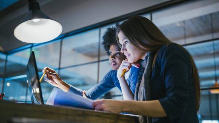 pair-women-laptop-electronic-submission-scaled-1-1