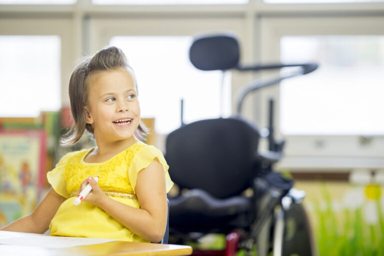 Happy Little Girl at School