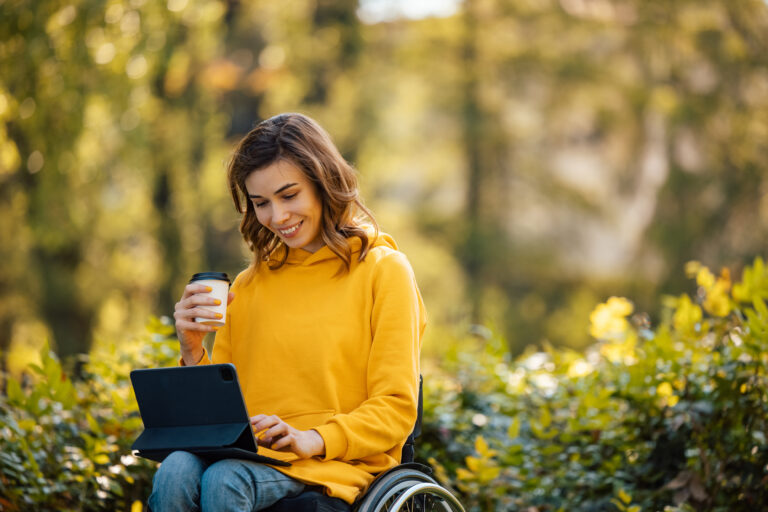Adult woman, joining the conference call, in the park.