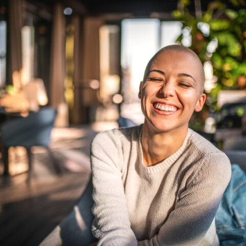 Portrait of a smiling girl with short hair